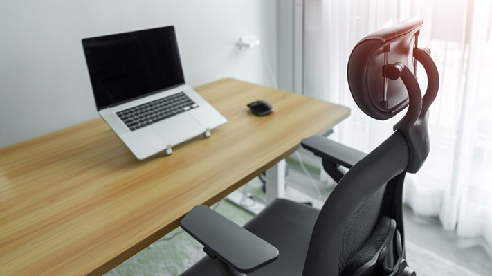 An ergonomic office chair in a home office.
